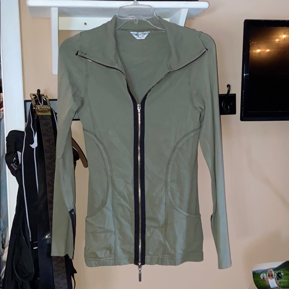 Green zip up.